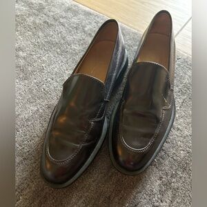 Tod’s Black Leather Loafers